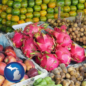 an ethnic fruit market display - with Michigan icon