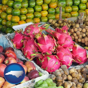 an ethnic fruit market display - with North Carolina icon